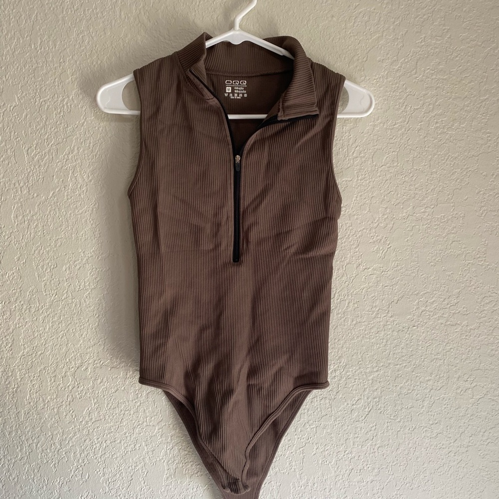 Brown body suit